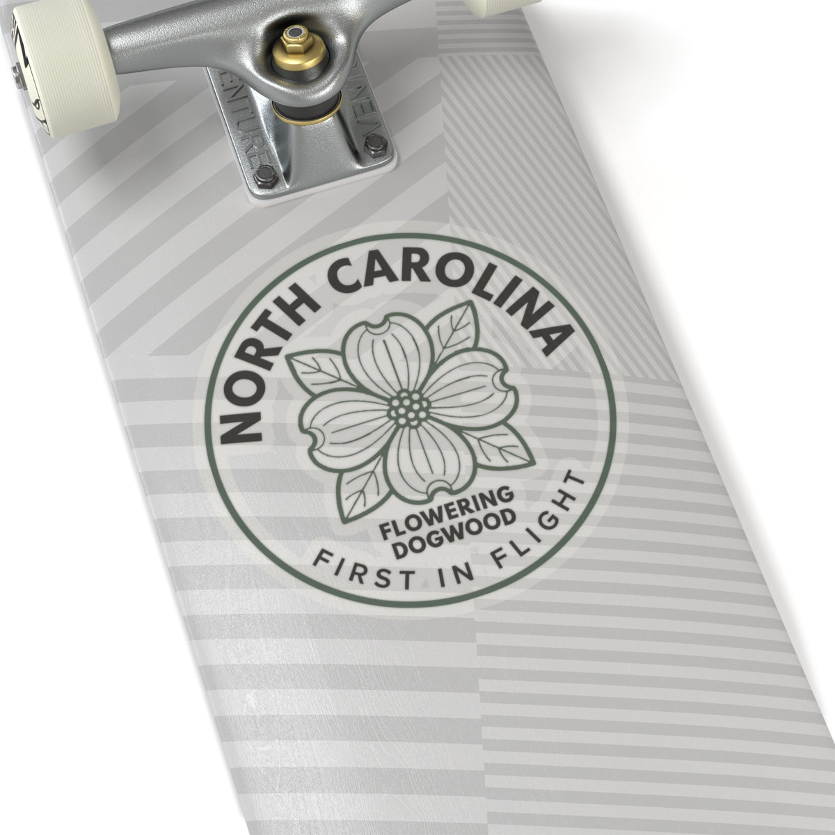 Transparent vinyl sticker with circular North Carolina dogwood flower seal