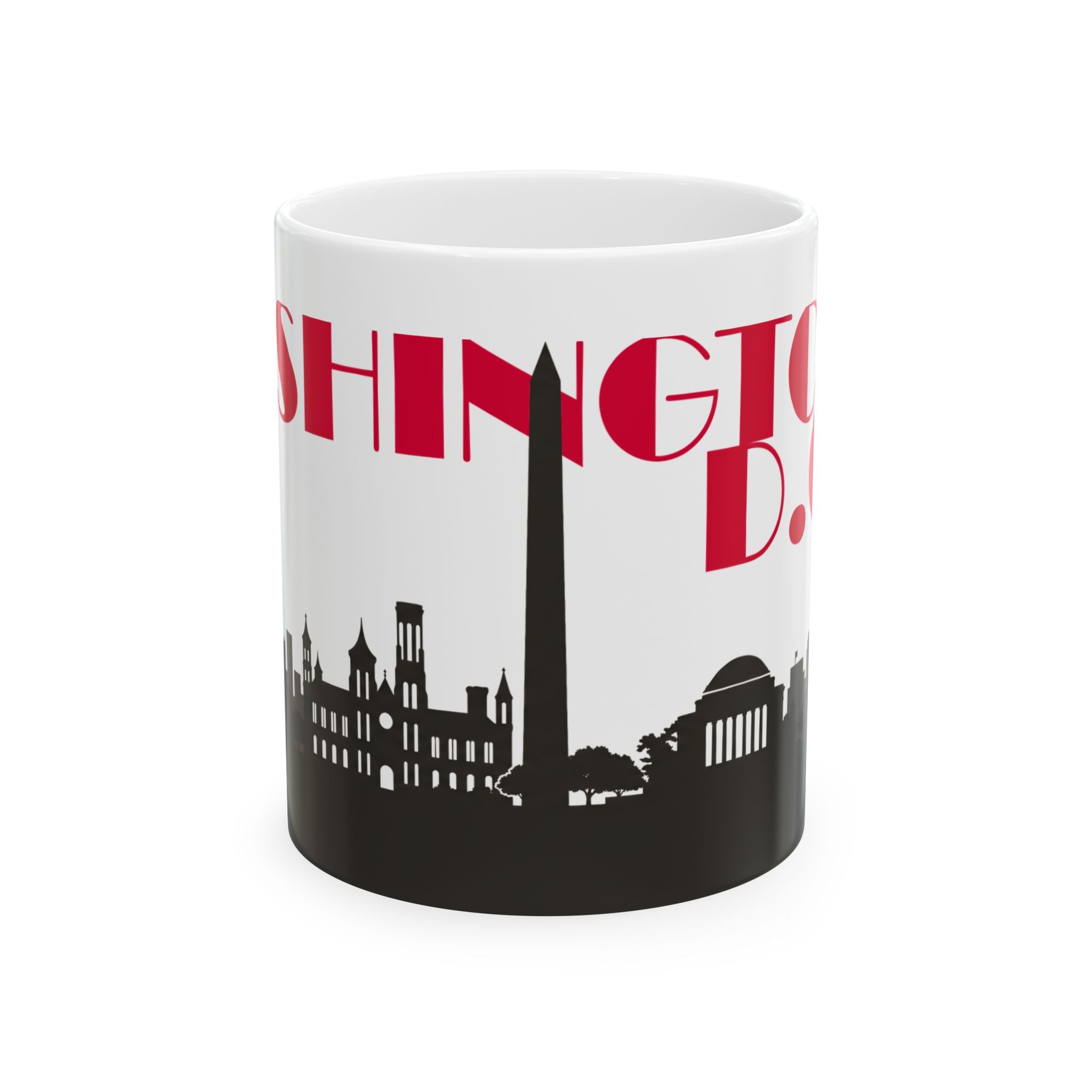 White ceramic mug with red 'D.C.' text and black D.C. skyline silhouette