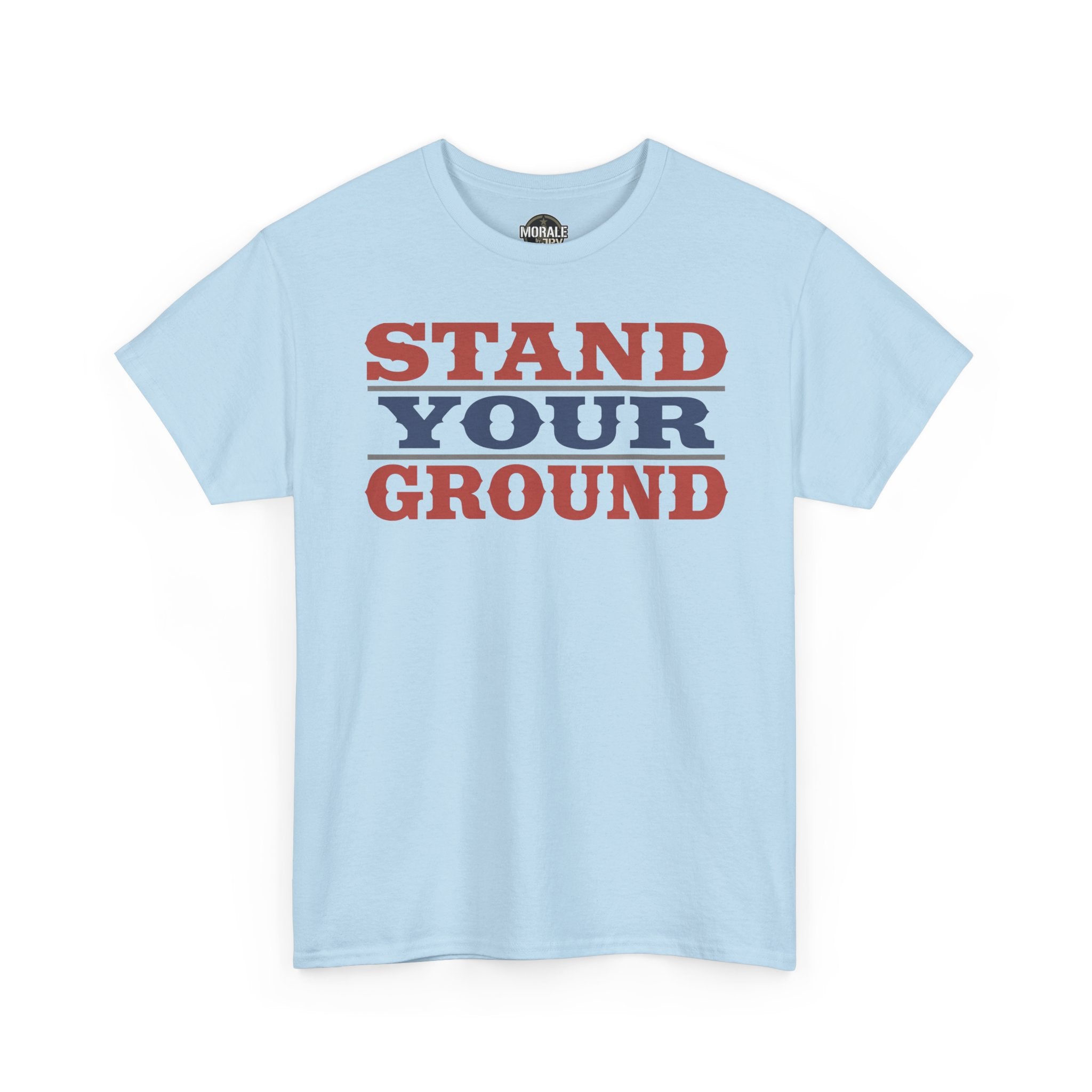 Light blue T-shirt with bold vintage “STAND YOUR GROUND” text graphic on front