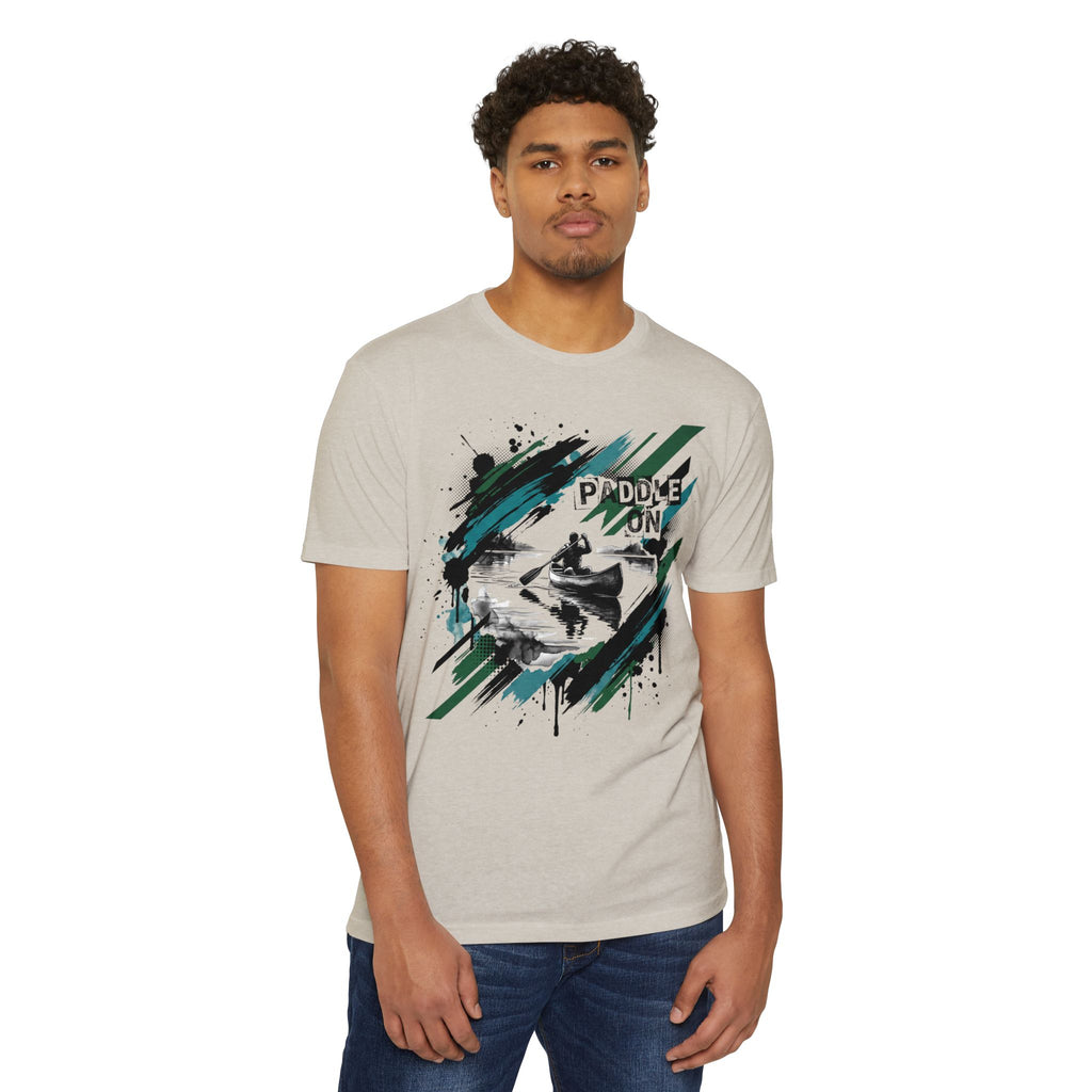 Beige short-sleeve T-shirt with “PADDLE ON” kayak graphic, worn by a model