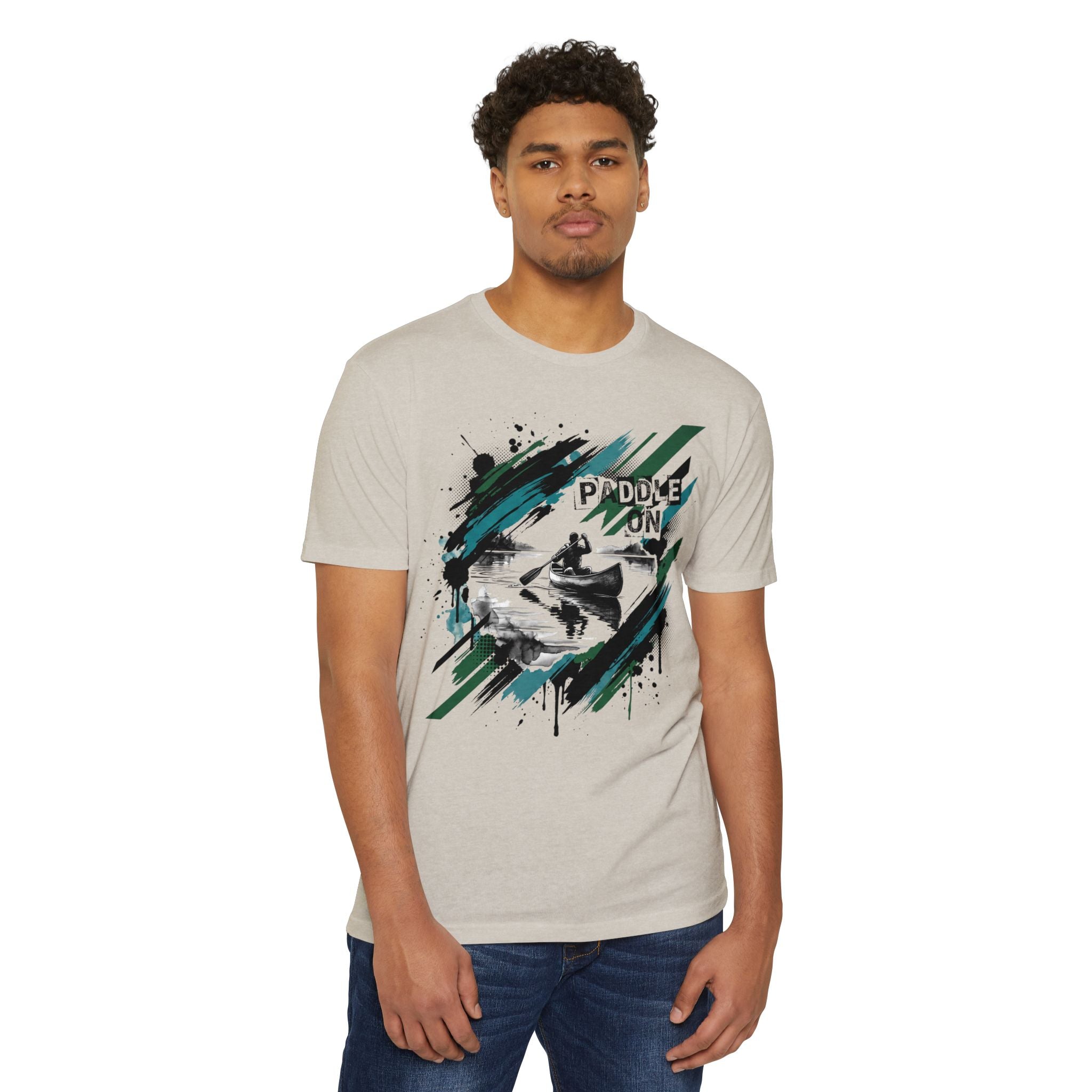 Beige short-sleeve T-shirt with “PADDLE ON” kayak graphic, worn by a model