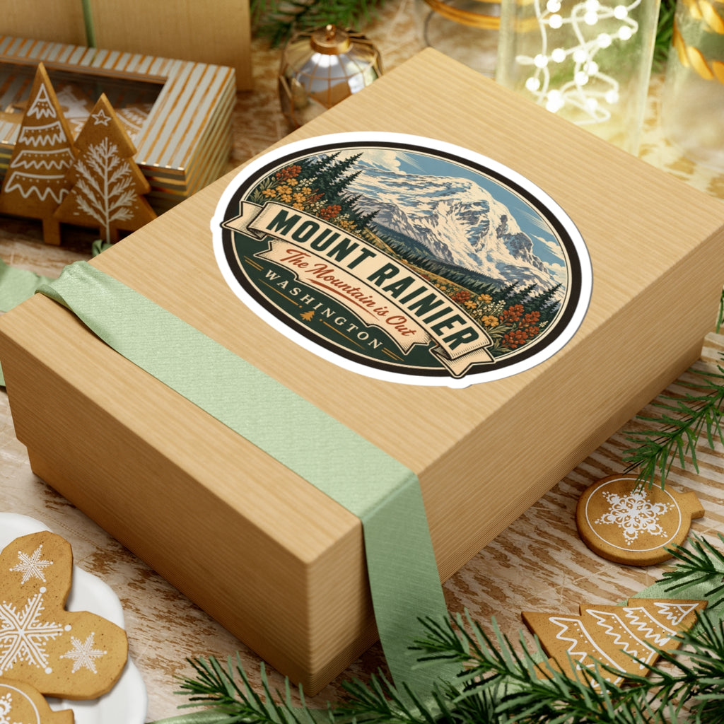 Oval Mount Rainier sticker on gift box lid with mountain peak artwork and WASHINGTON banner