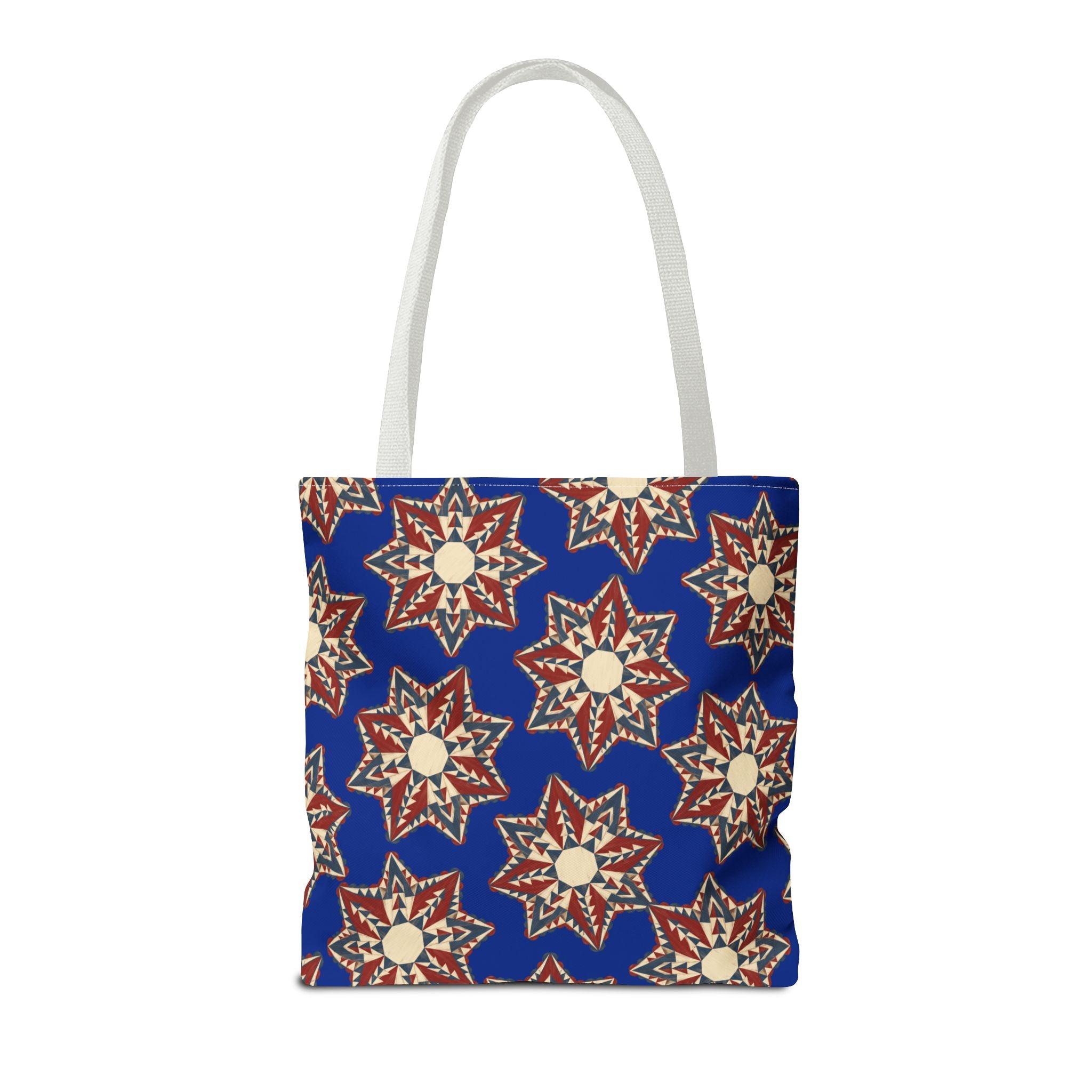 Blue starburst floral tote bag with white handles, square top-opening design