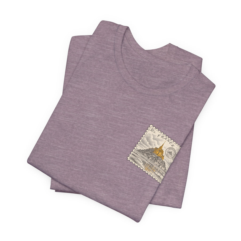 Heather mauve heather short-sleeve t-shirt stack with small vintage postage stamp graphic.