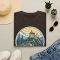 Dark brown T-shirt with circular castle landscape illustration graphic