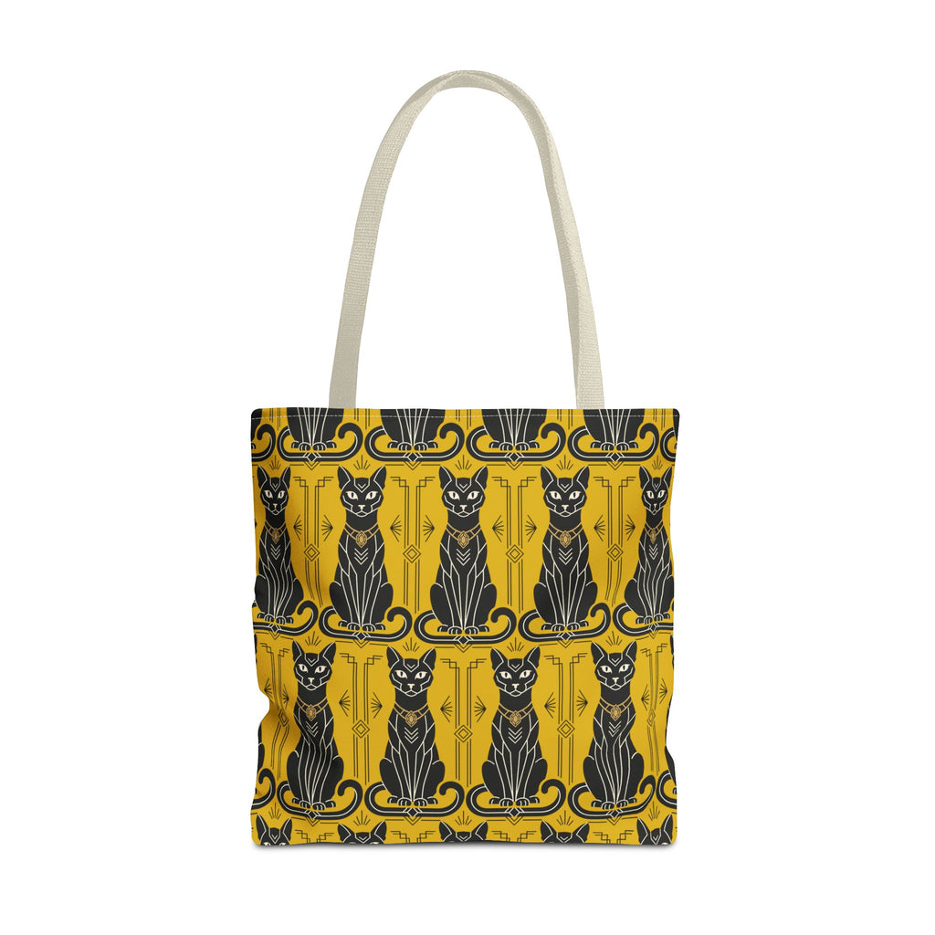 Yellow tote bag with repeating black cat faces and ornate border; beige handles
