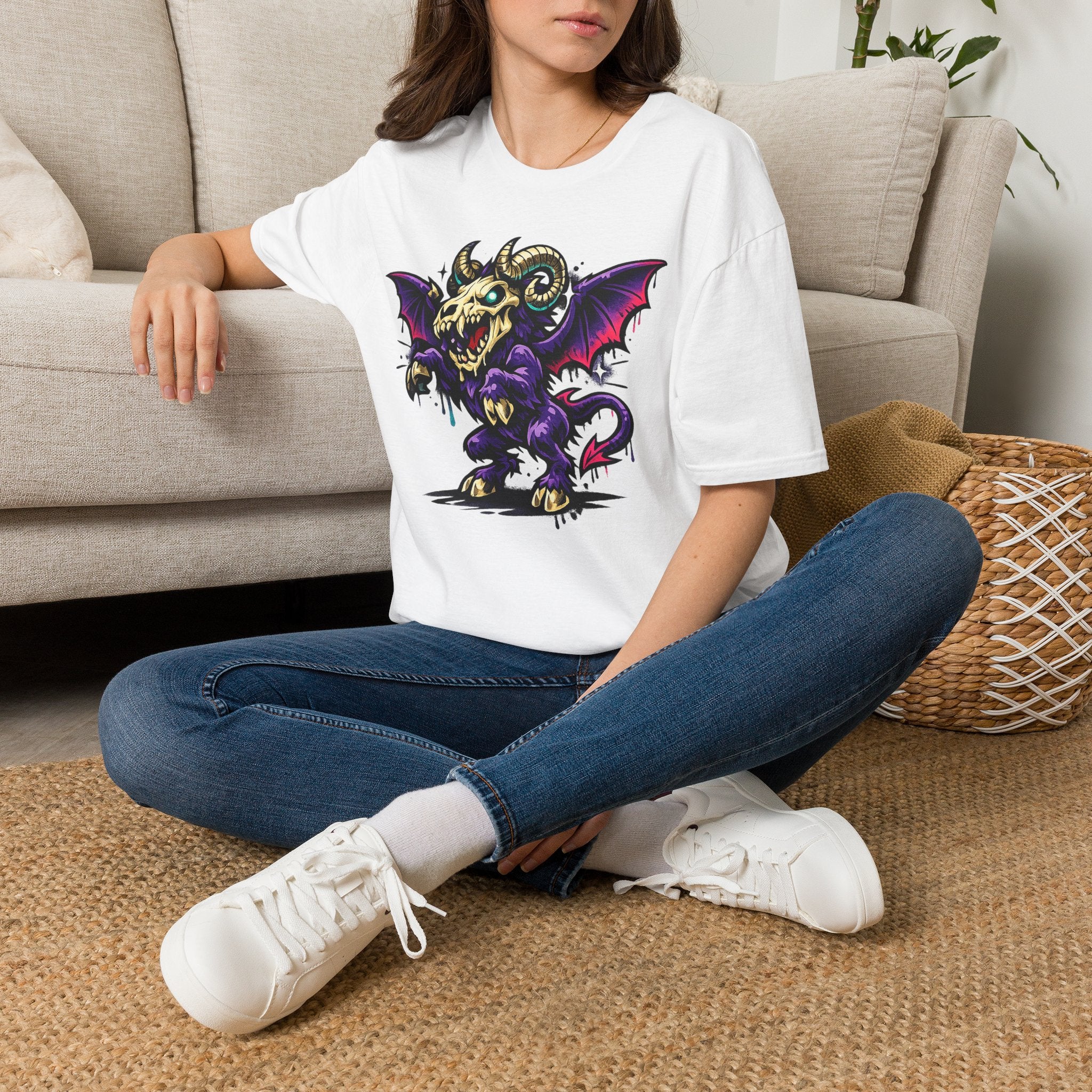 White graphic monster t-shirt featuring a bat-winged ram skull demon design