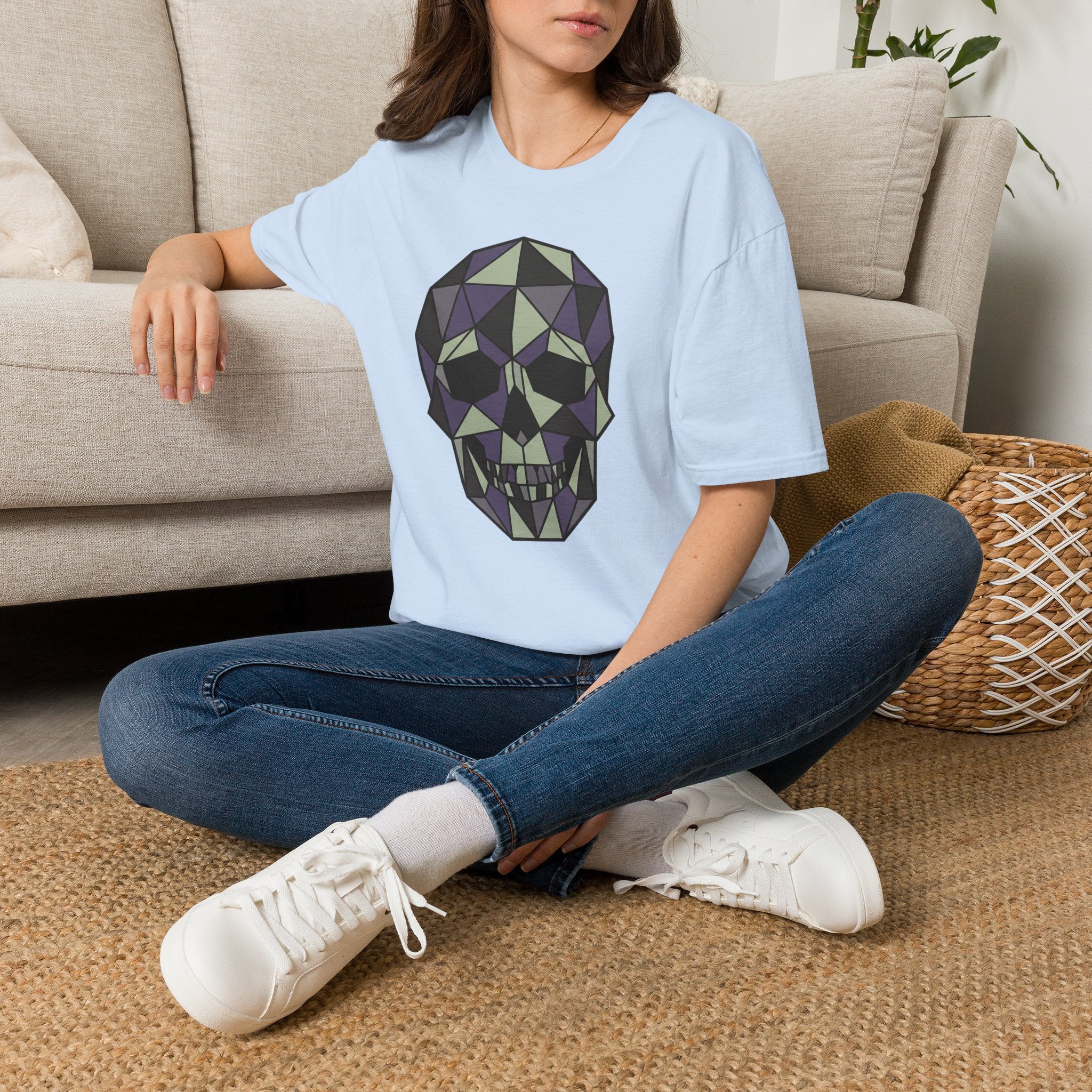 Light blue T-shirt with geometric low-poly skull graphic on the front