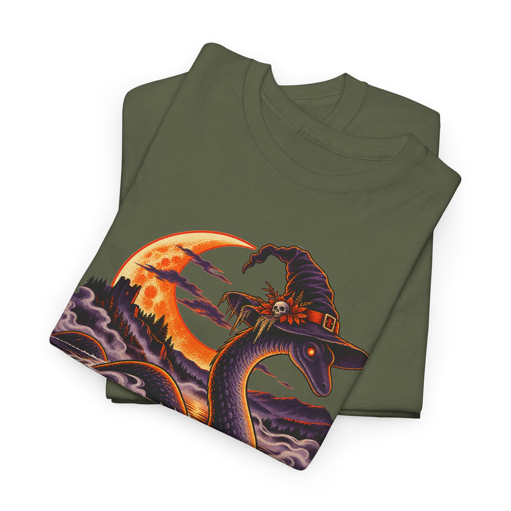 Dark olive green crewneck t-shirt with colorful cryptid-and-witch graphic on the front.
