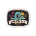 Die-cut sticker-style magnet with oval Kansas scenic artwork and thick white border