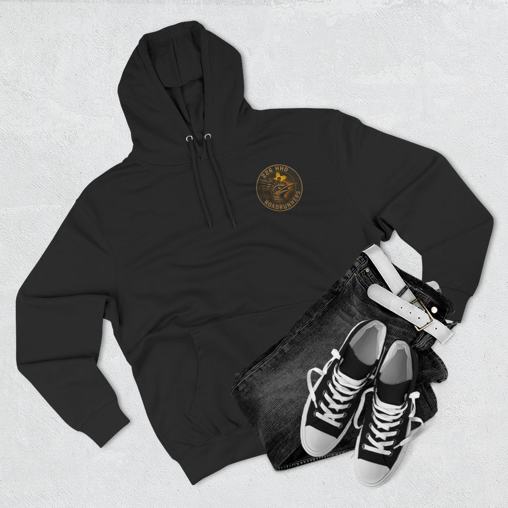 Black pullover hoodie with drawstring hood and round chest logo.