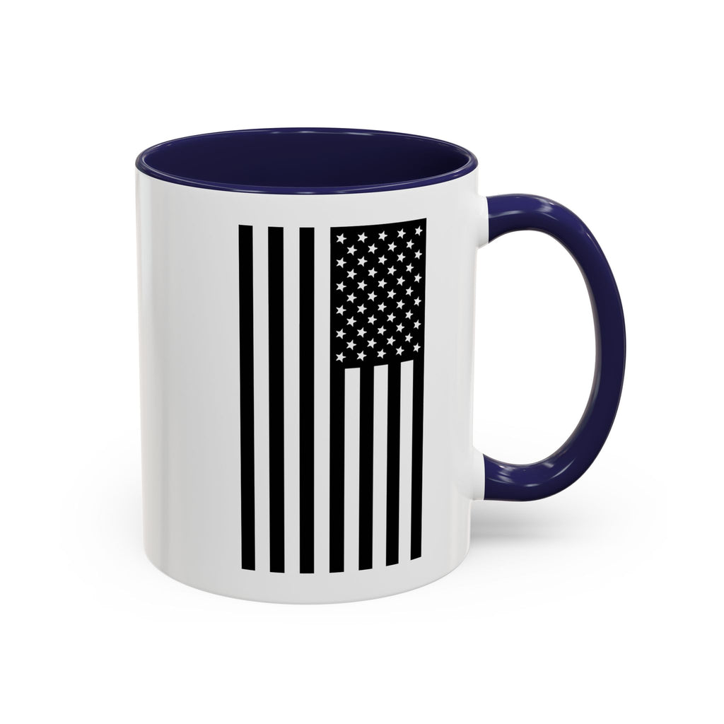 White coffee mug with navy handle and rim, featuring American flag stripe and stars design.