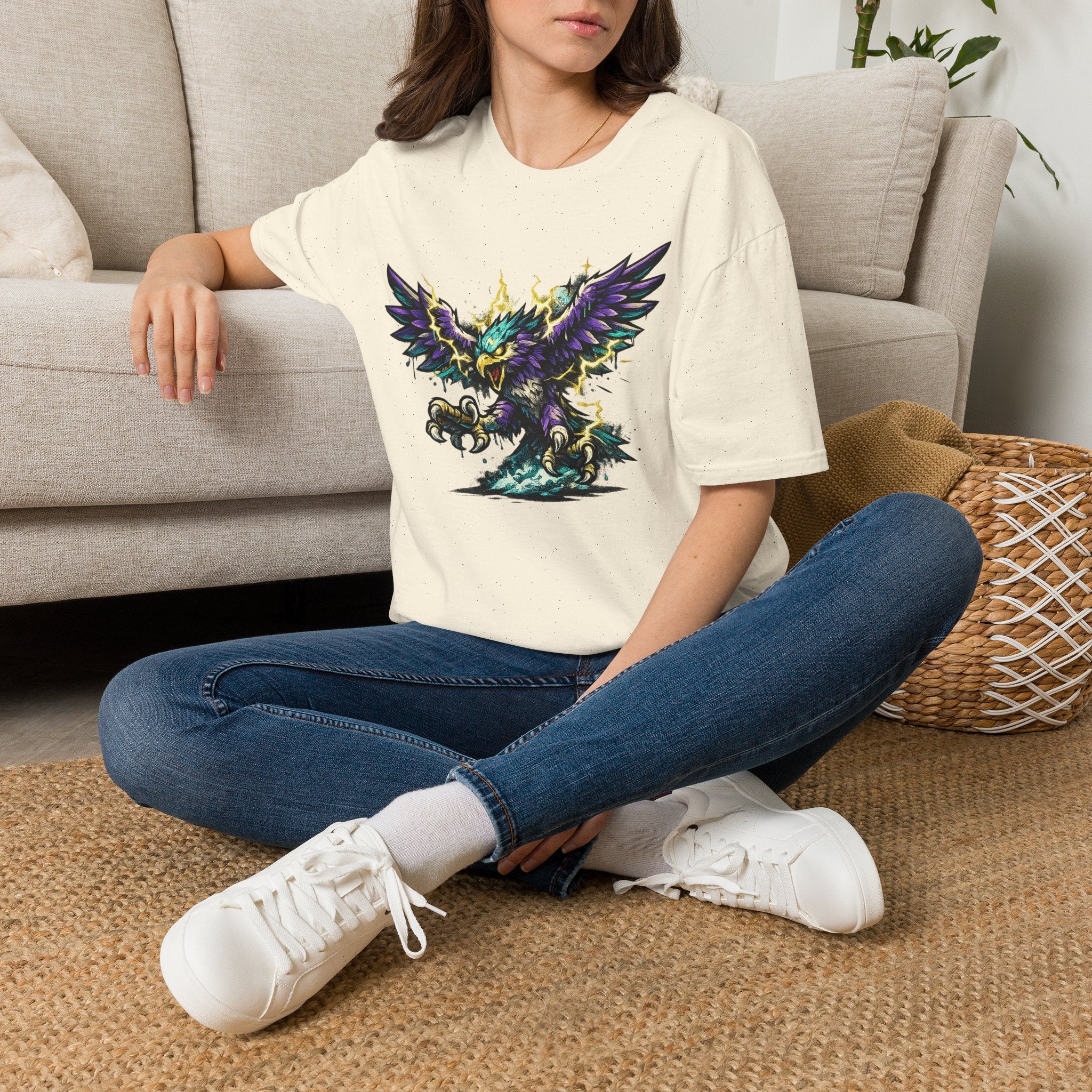 Cream crew-neck T-shirt with colorful lightning bird graphic on chest