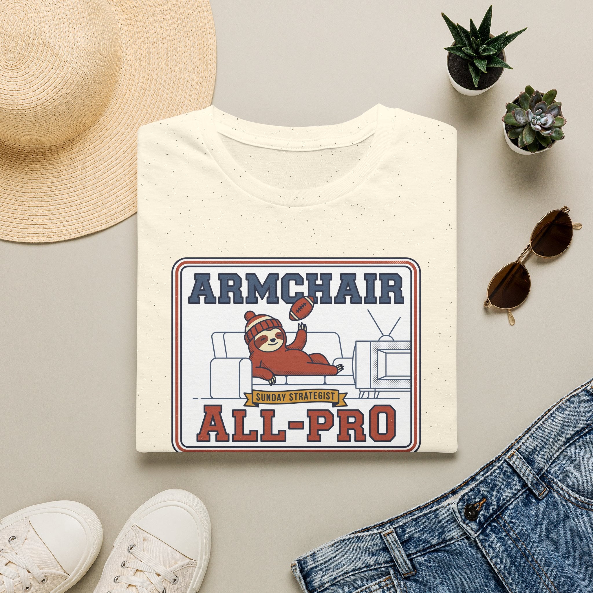 Funny sloth graphic football T-shirt in white, “Armchair All-Pro” print