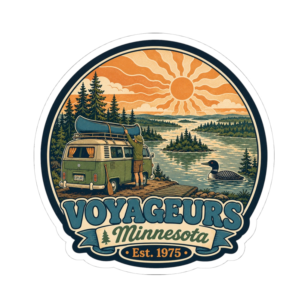 Round die-cut sticker showing green camper van, forest, lake water, orange sun; Voyageurs Minnesota