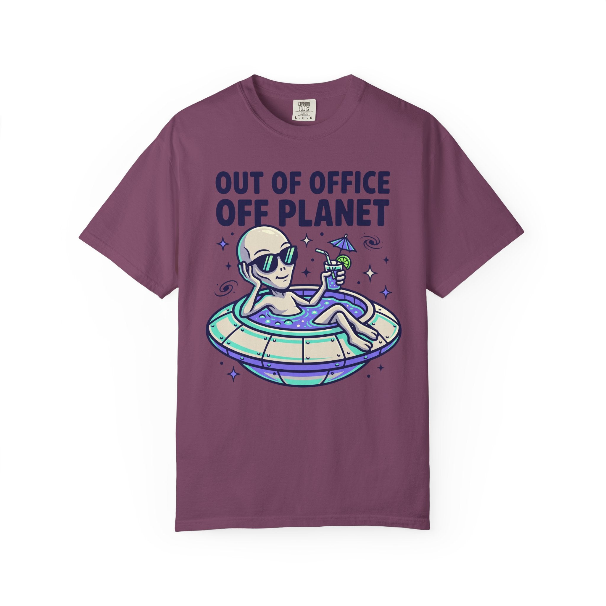 Dark plum alien graphic T-shirt with floatie and 'OUT OF OFFICE OFF PLANET' text