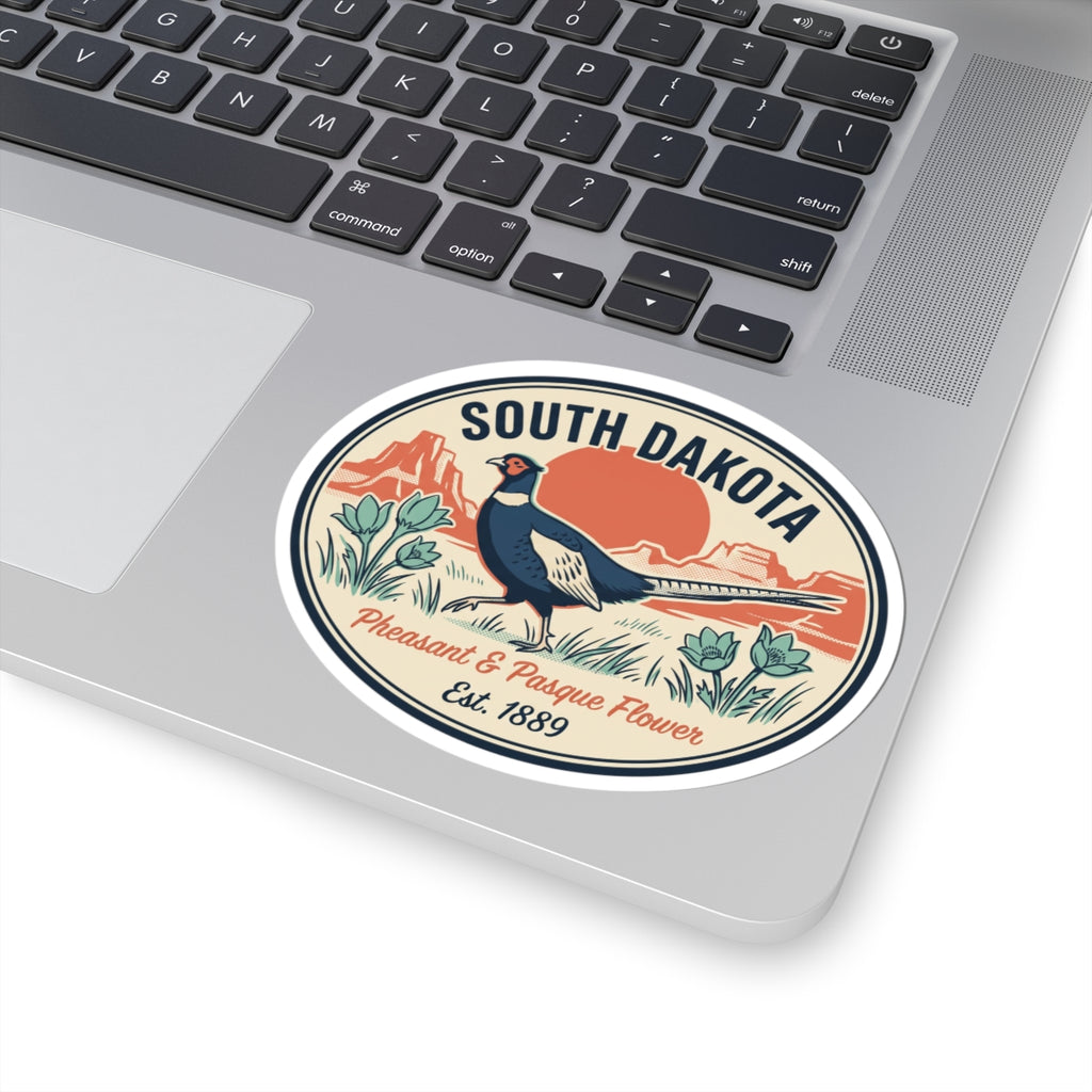 South Dakota circular decal sticker on a laptop, featuring pheasant and Est. 1889 text