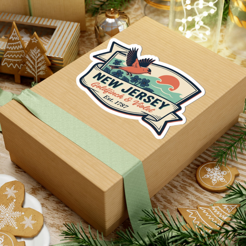 New Jersey badge sticker on wrapped gift, bird and flowers with “Est. 1787”.