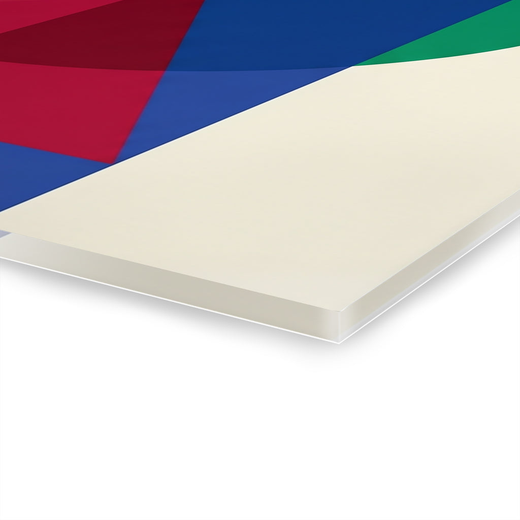 Close-up of the wall art edge with overlapping red, blue, and green polygon shapes.