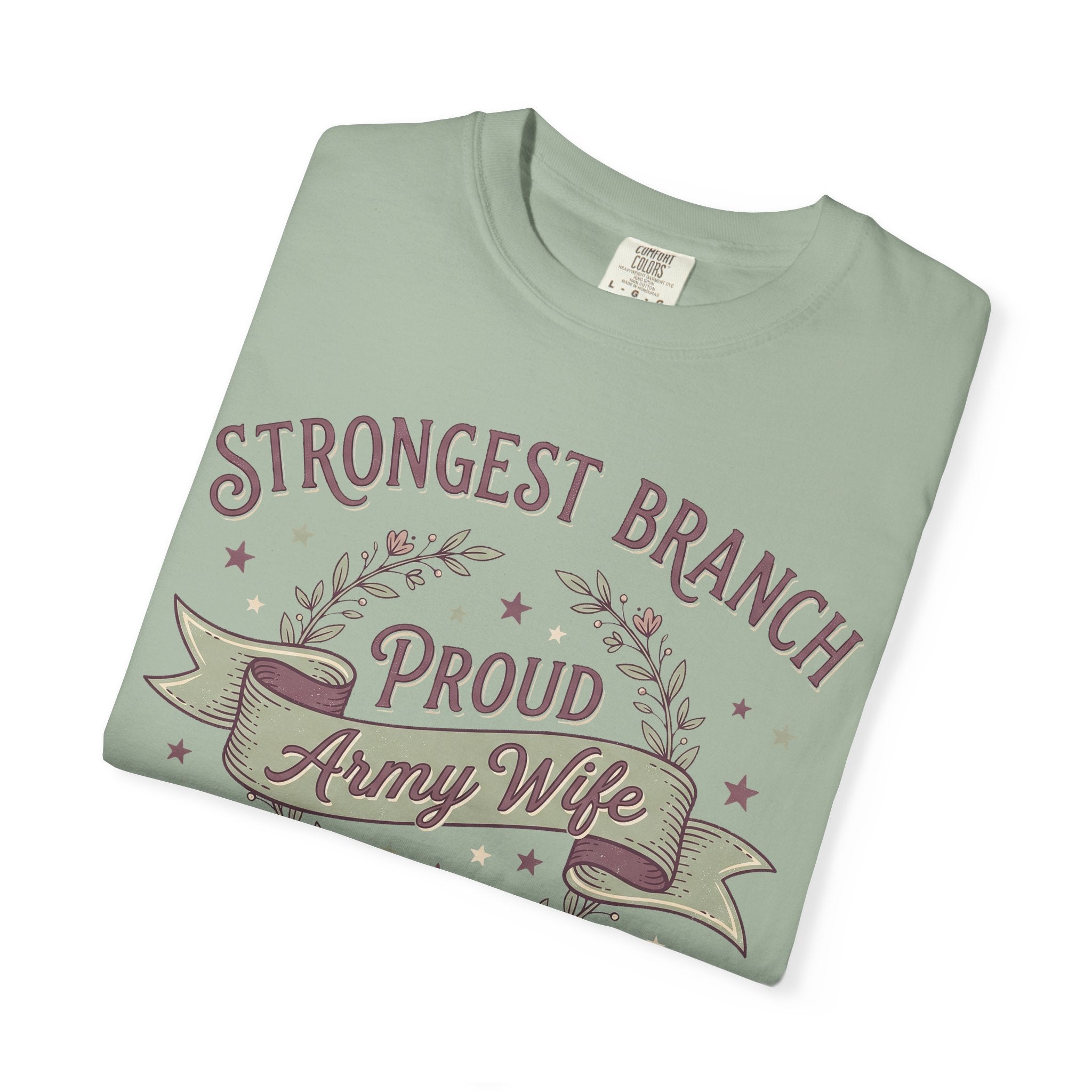 Green T-shirt with crew neck; graphic text reads “STRONGEST BRANCH” and “Proud Army Wife”.