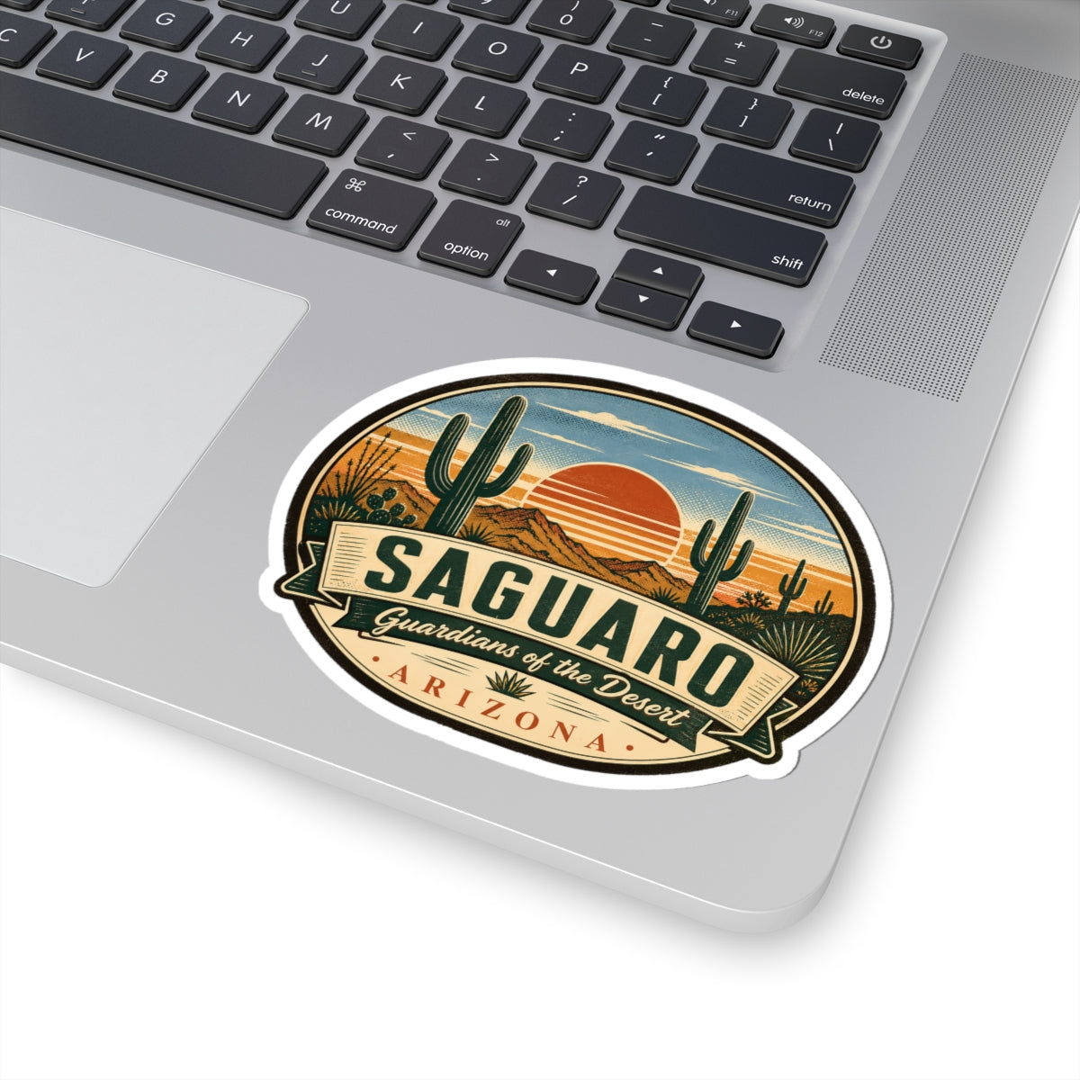 Saguaro Arizona travel sticker on a laptop near the trackpad