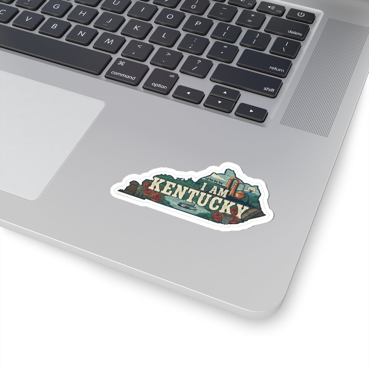 I AM KENTUCKY die-cut sticker with Kentucky map art, roses, and bottle details