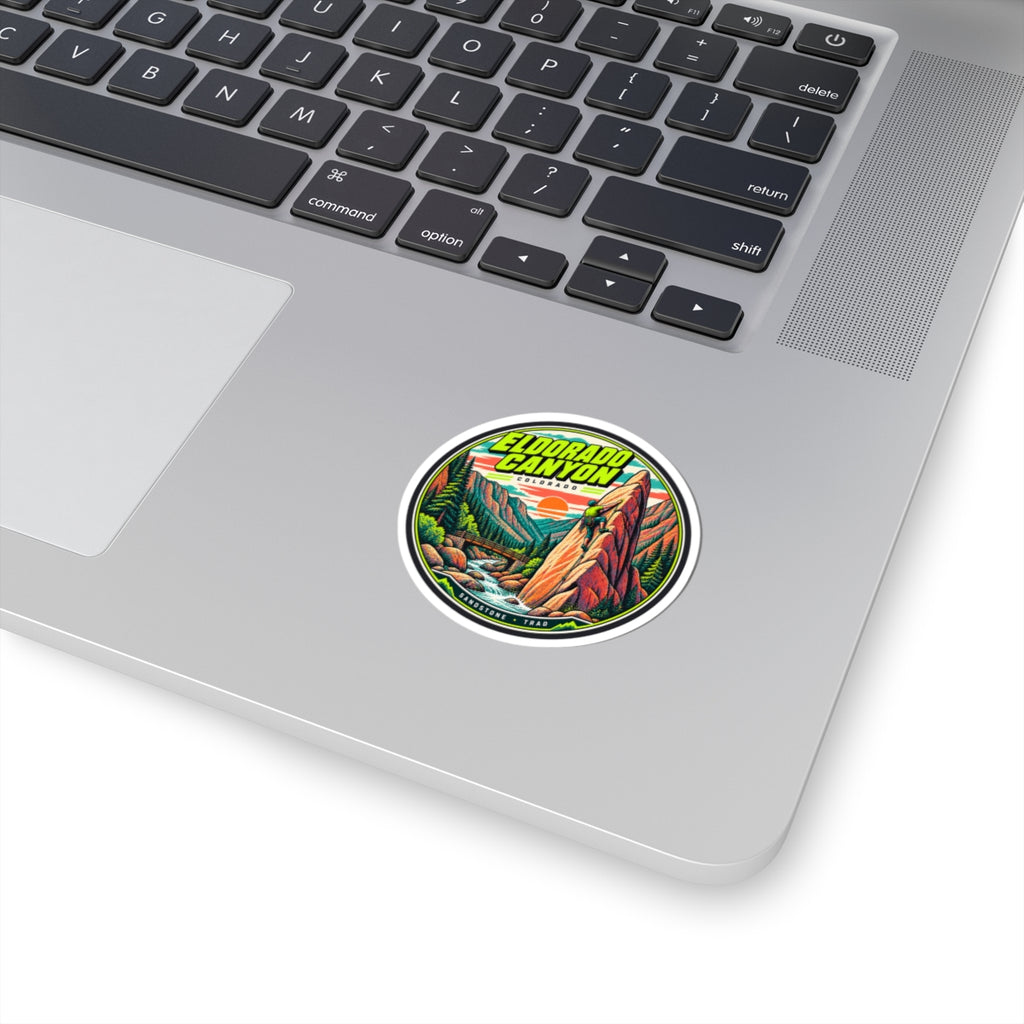 Round Eldorado Canyon climbing sticker with colorful rock landscape and green text
