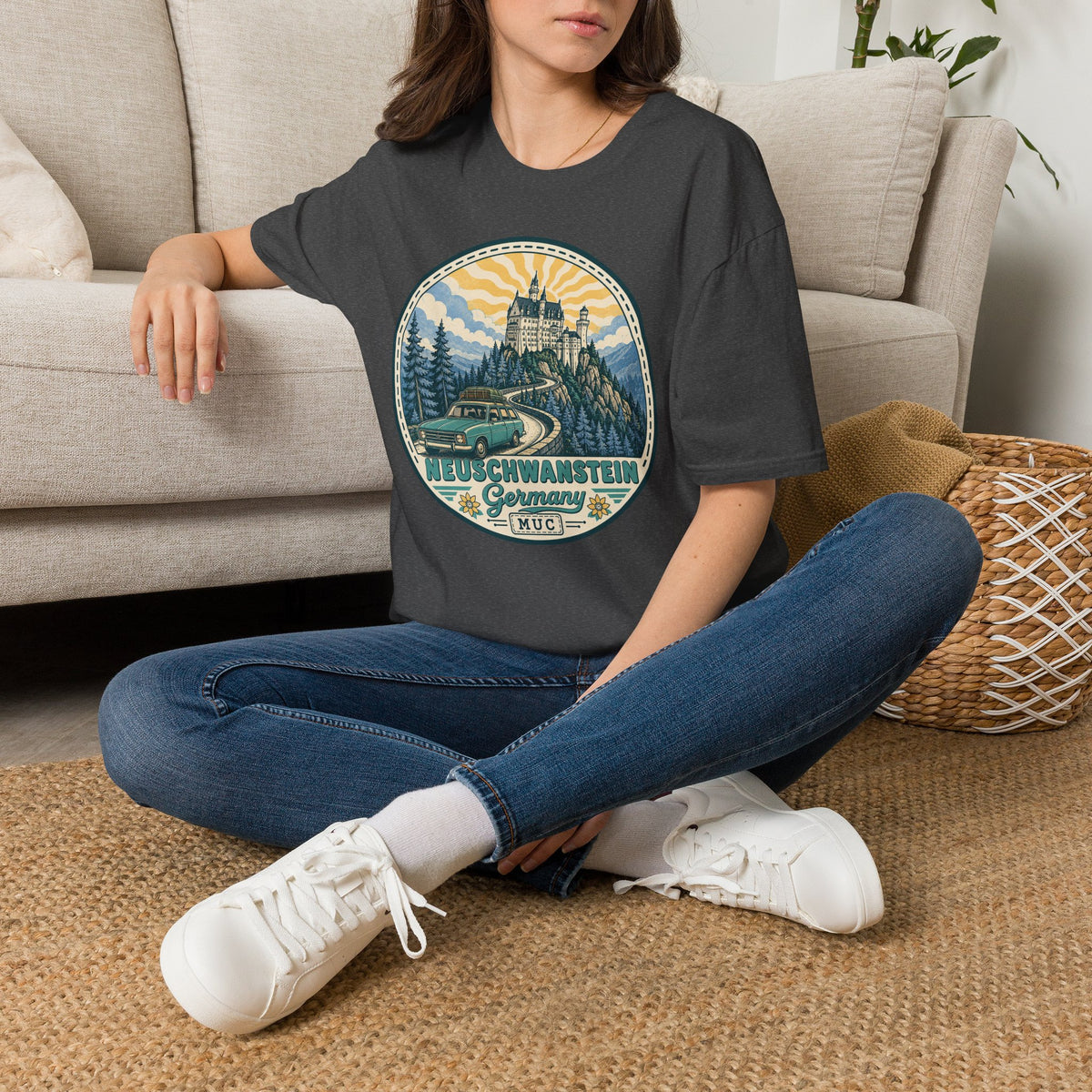 Dark gray graphic T-shirt with circular Neuschwanstein castle illustration on chest