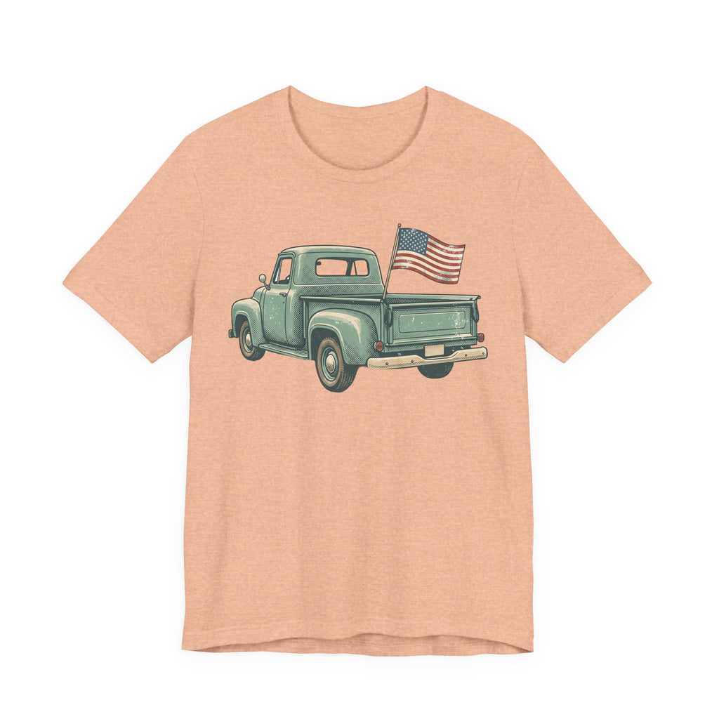 Peach T-shirt with green pickup truck and American flag graphic