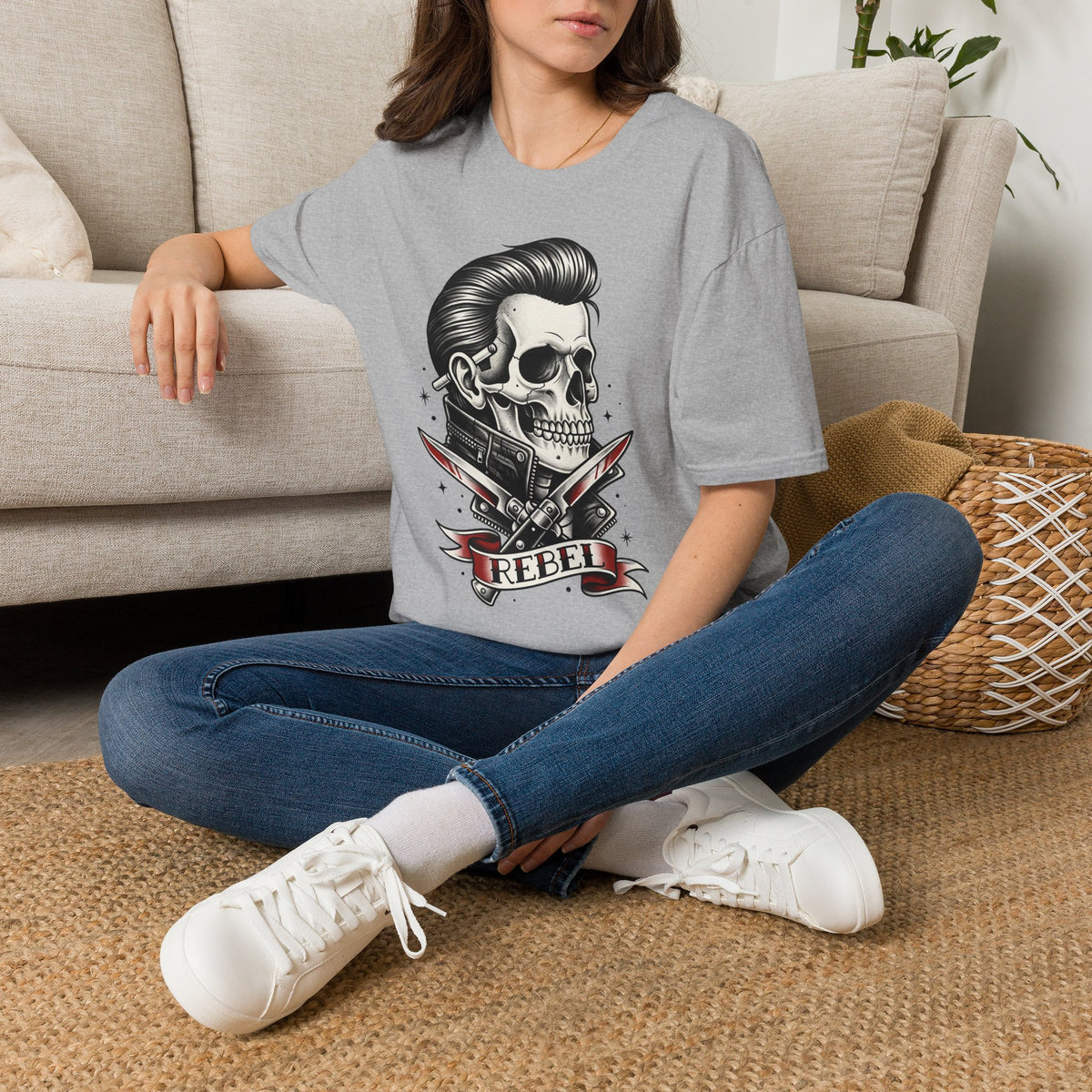 Heather gray unisex T-shirt with skull and knives graphic and “REBEL” badge
