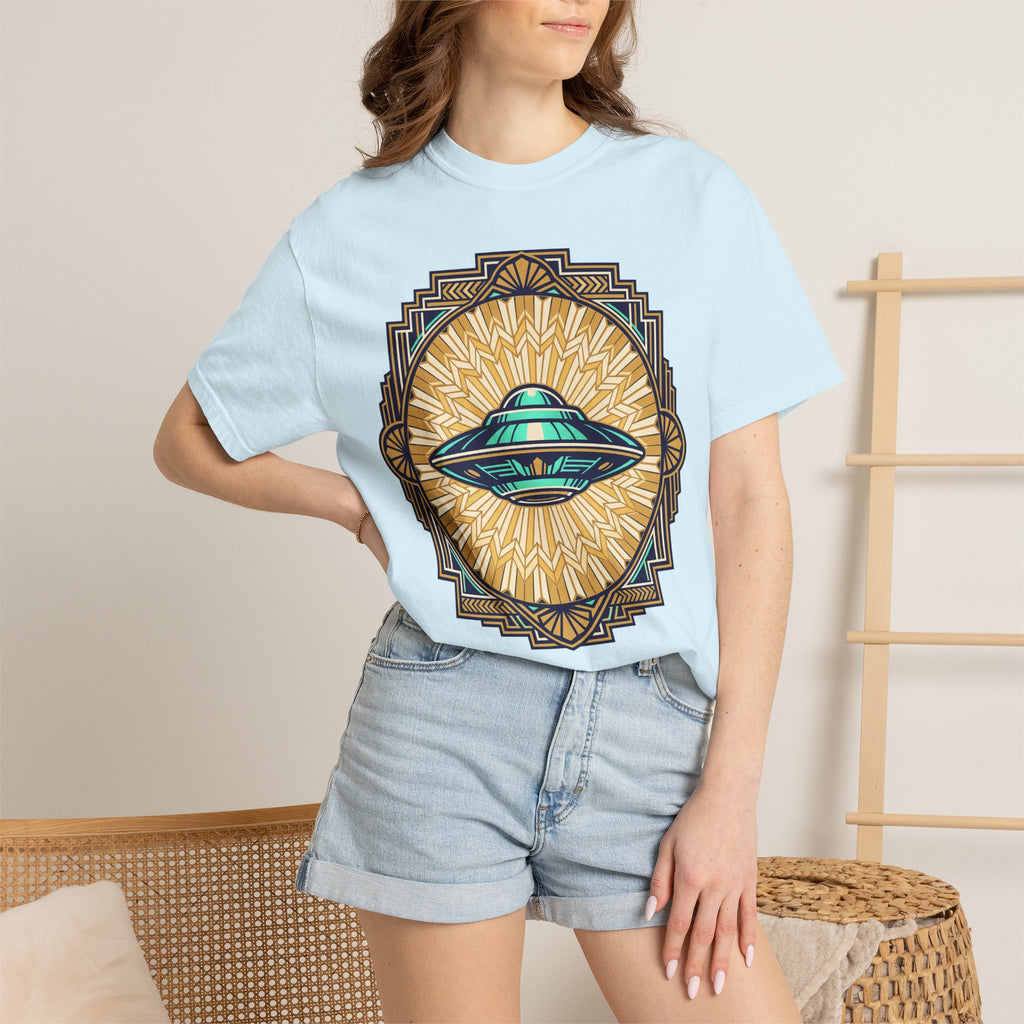 Light blue crew-neck T-shirt worn by model; front shows retro UFO sunburst emblem.