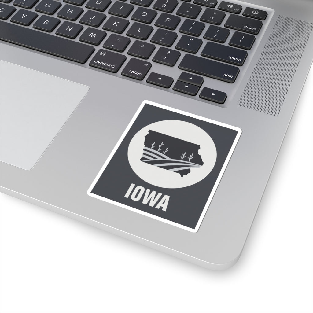 Iowa farmland graphic kiss-cut sticker with black background, white circle emblem, and “IOWA”
