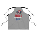 Gray apron front with black ties; colorful bull graphic and “THESE COLORS DON’T RUN”