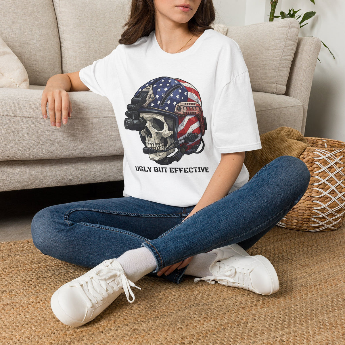 Woman wearing a white T-shirt with helmeted skull and American flag graphic