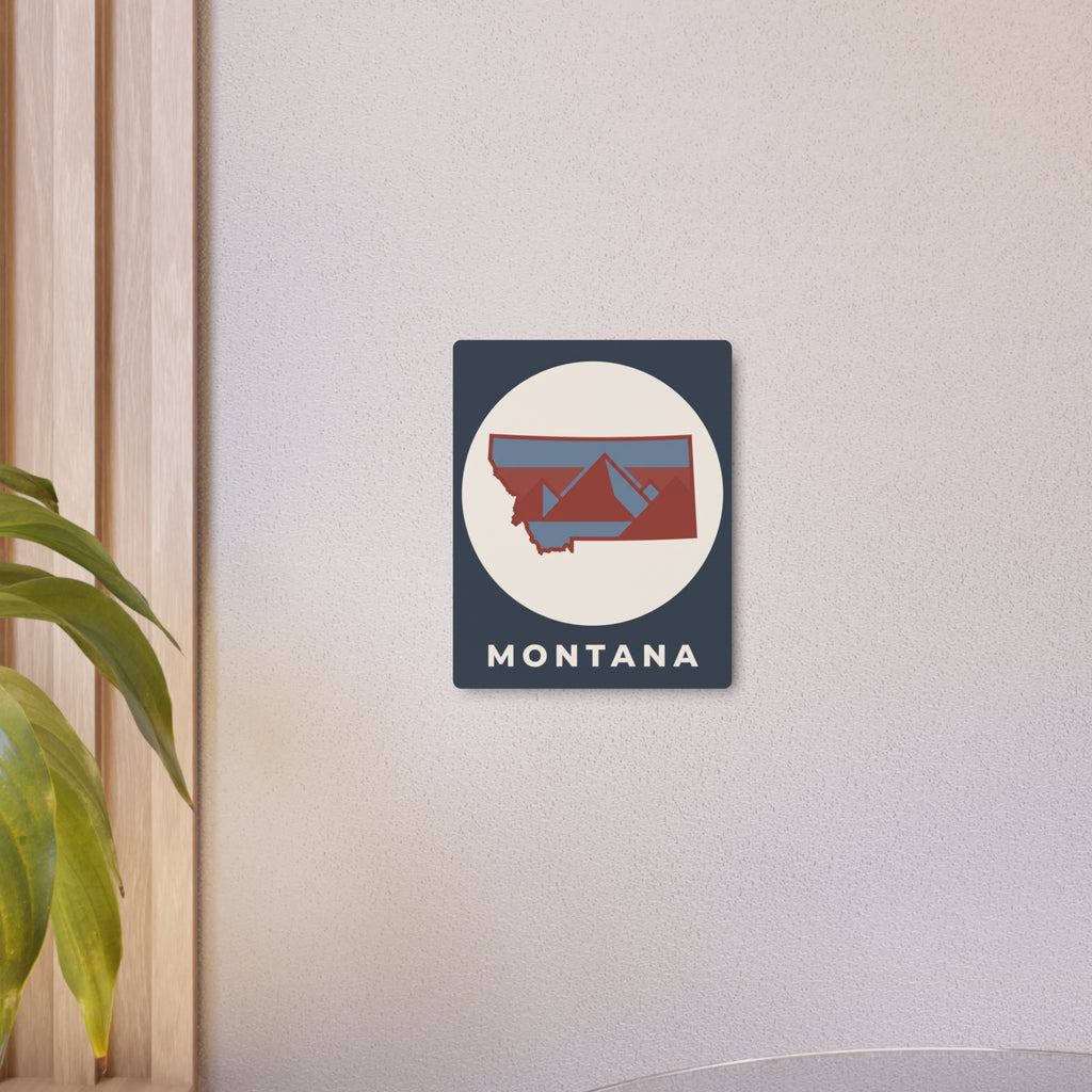 Mounted Montana metal art sign, dark blue square with circular state outline and MONTANA text.