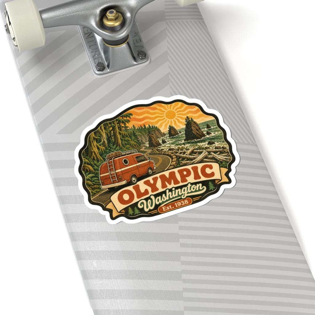 Vinyl sticker with orange vintage camper, forest landscape, sun, “OLYMPIC Washington Est. 1938”