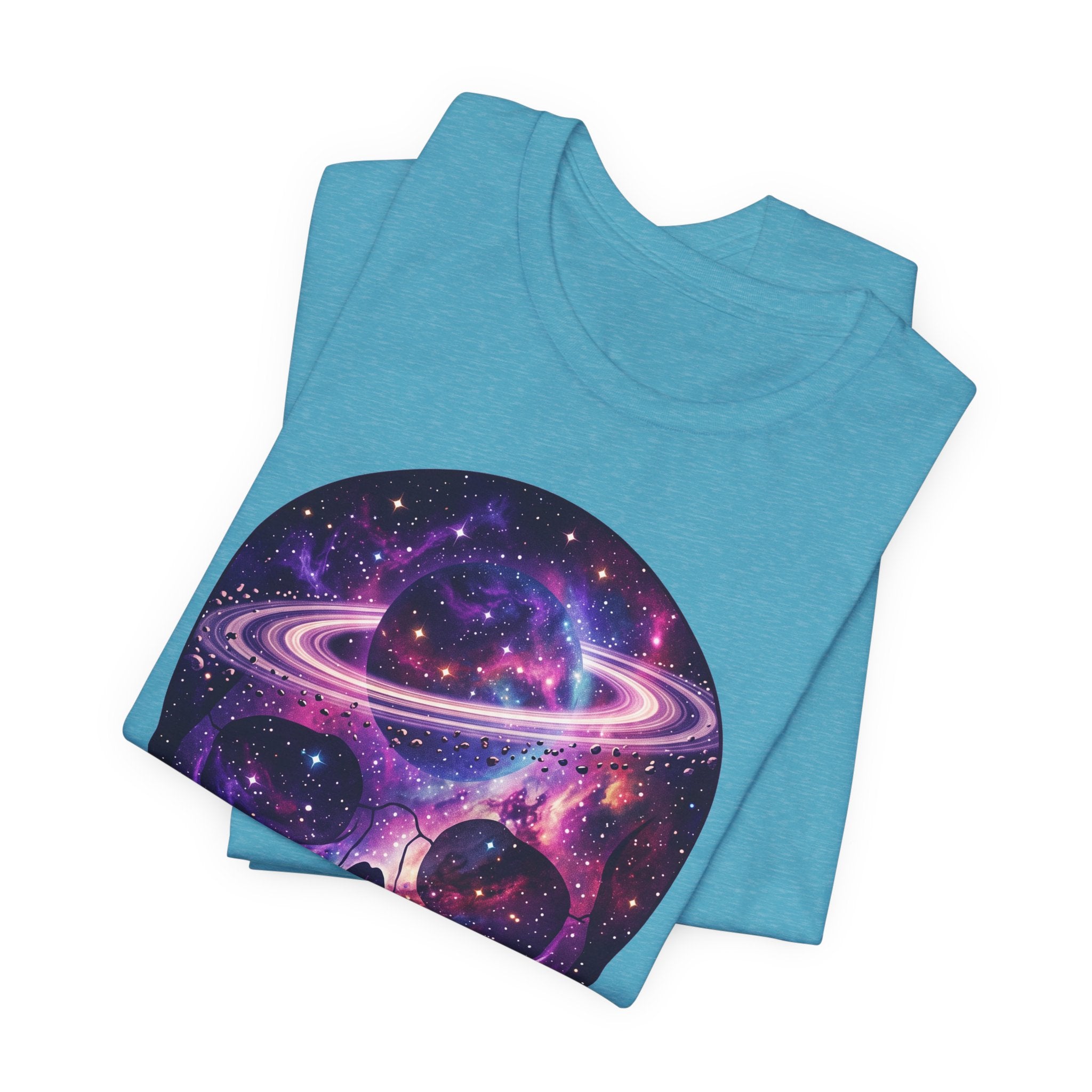 Galaxy skull T-shirt in heather aqua, nebula skull and Saturn ring print on fold