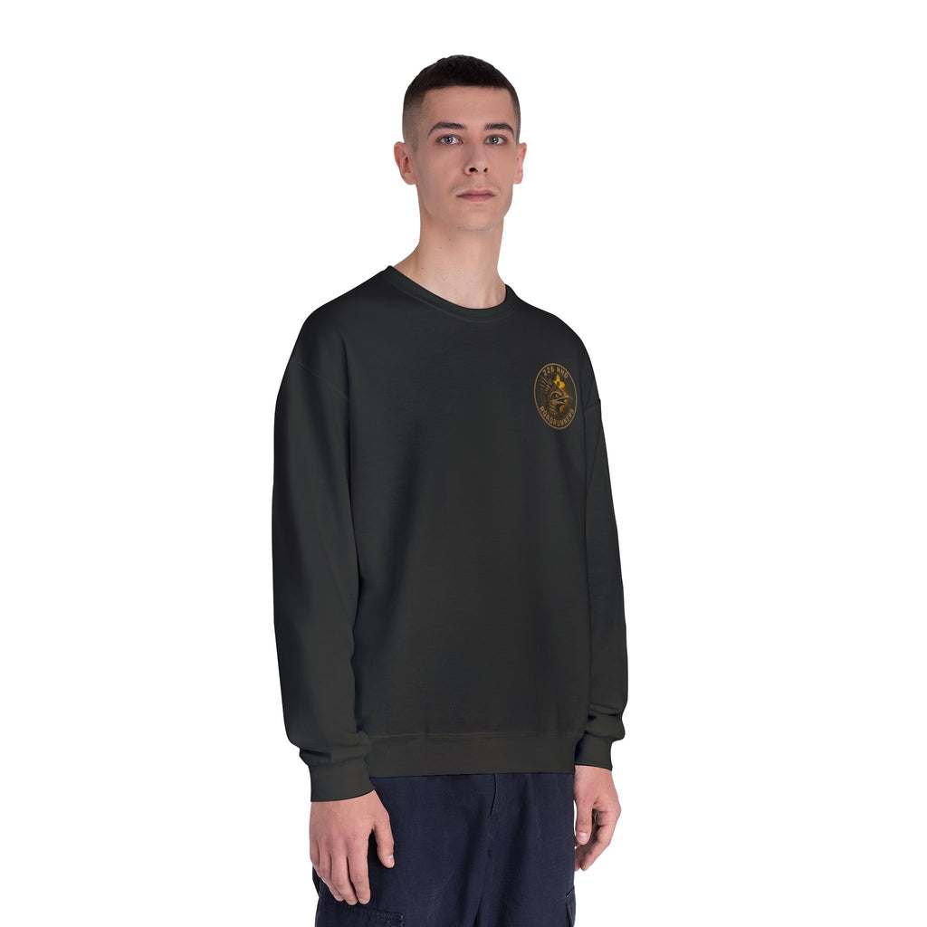 Black crewneck sweatshirt on model, front small patch emblem