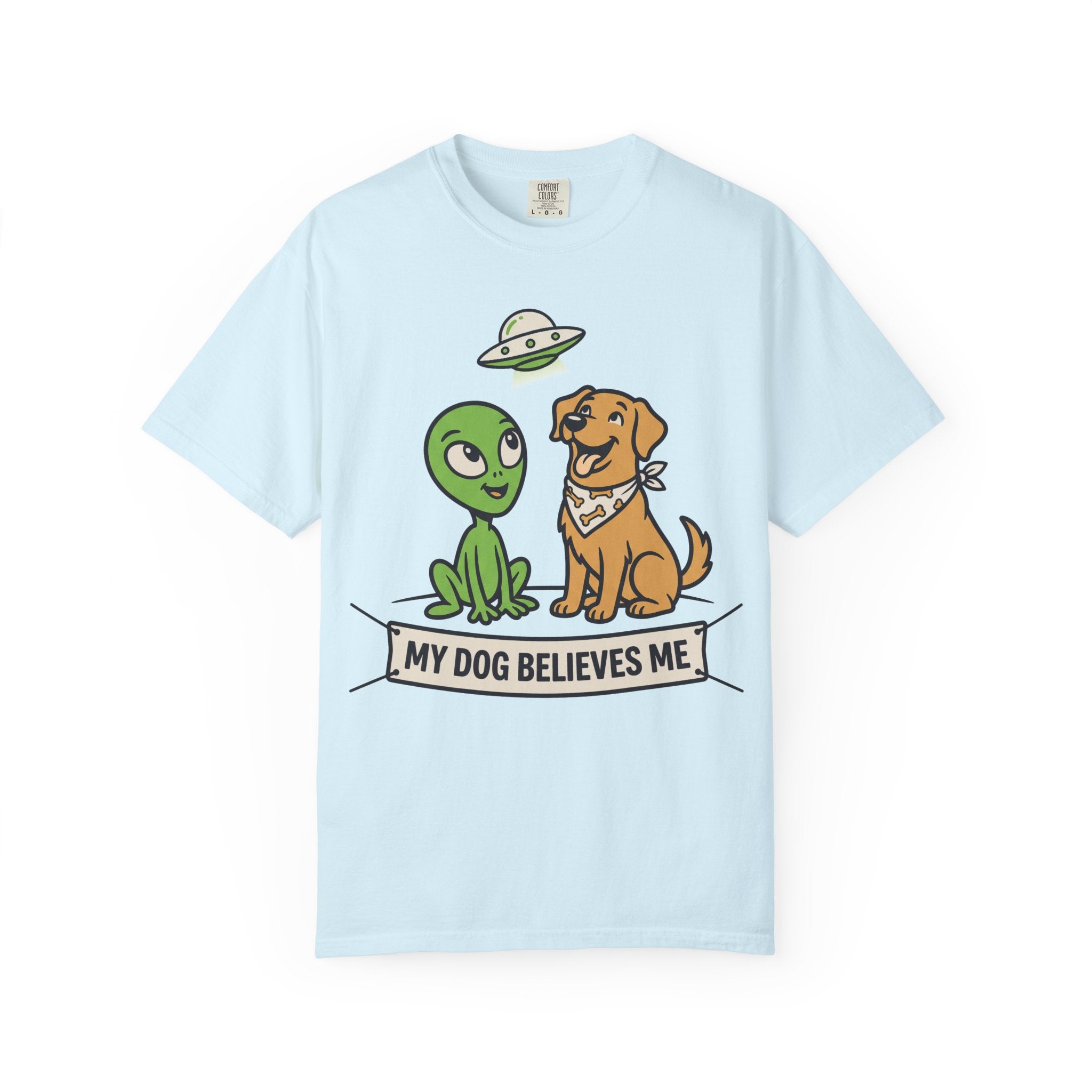 Light blue t-shirt with cartoon alien and dog and "My Dog Believes Me" banner graphic