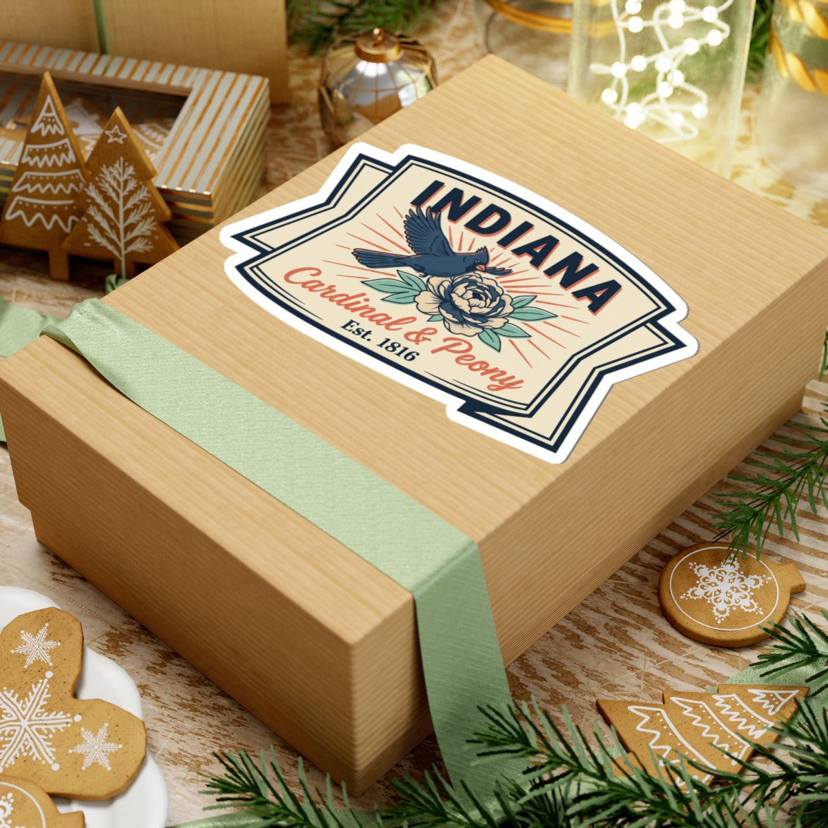 Vinyl sticker on a wrapped gift box with Indiana text, cardinal, peony flowers, Est. 1816.