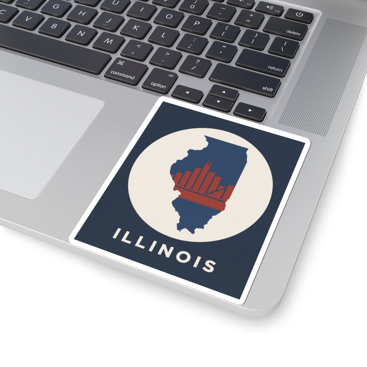 Square kiss-cut Illinois sticker: navy state outline, red skyline bars, white circle, ILLINOIS