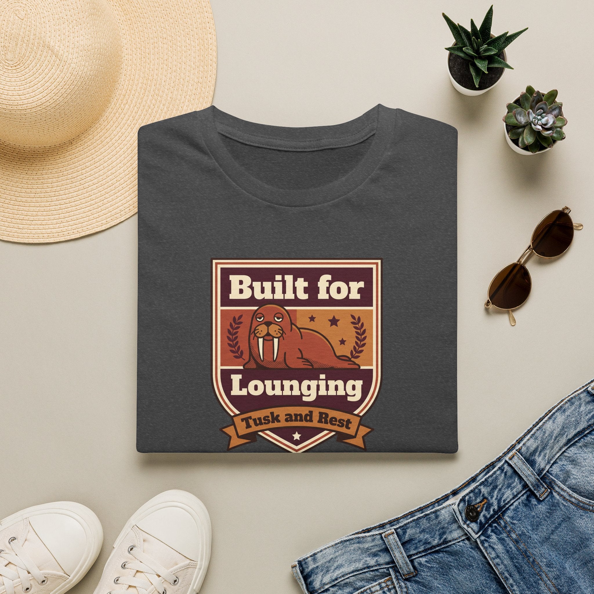 Charcoal gray t-shirt with walrus graphic and “Built for Lounging” badge, short sleeves