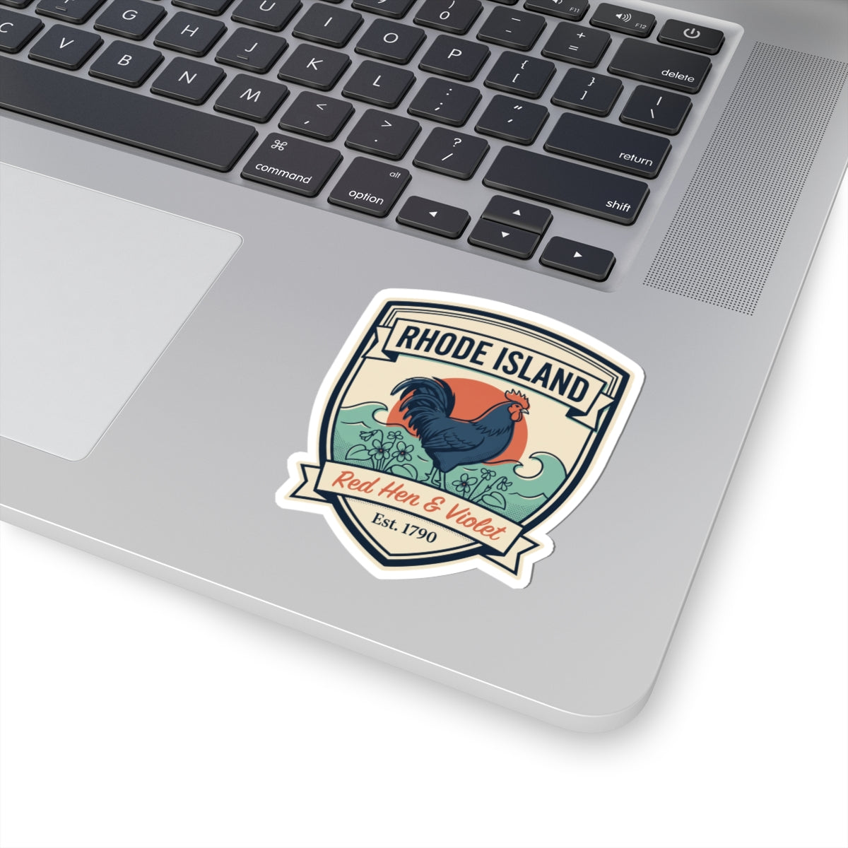 Rhode Island badge sticker on laptop palm rest