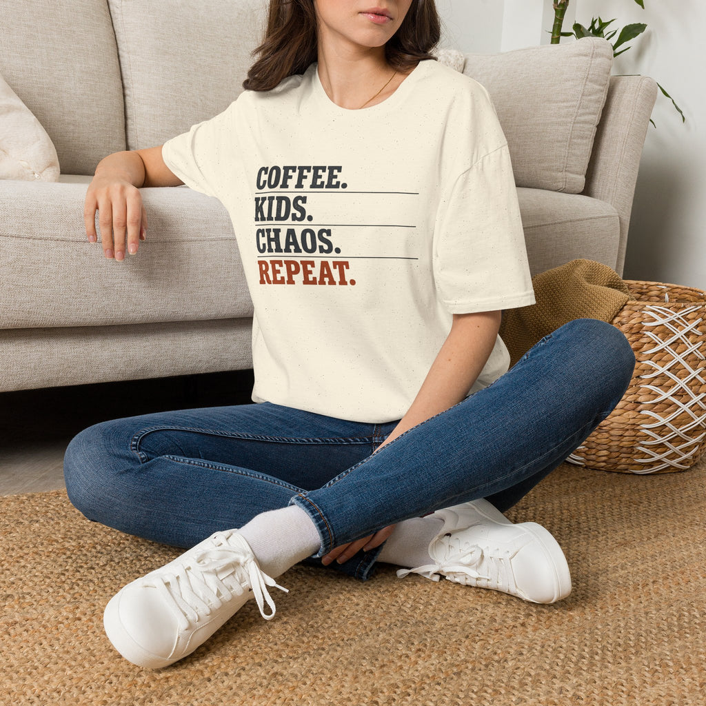 Natural/cream T-shirt with “COFFEE. KIDS. CHAOS. REPEAT.” text graphic