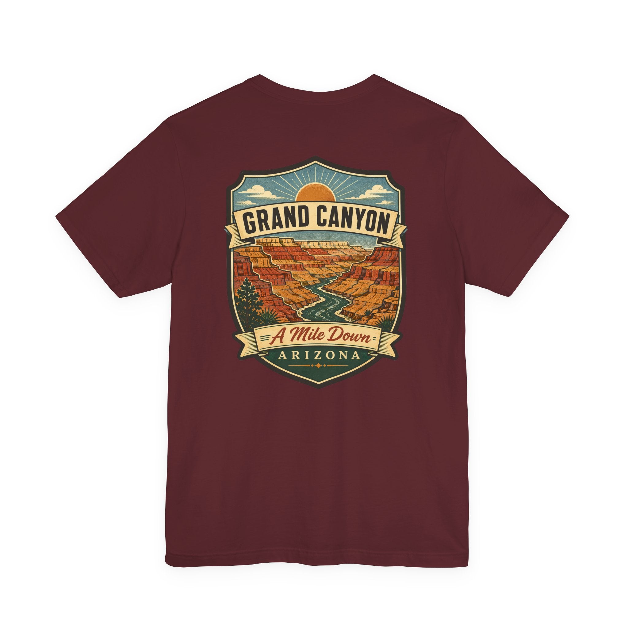 Grand Canyon souvenir T-shirt, dark maroon with large “GRAND CANYON” scenic graphic