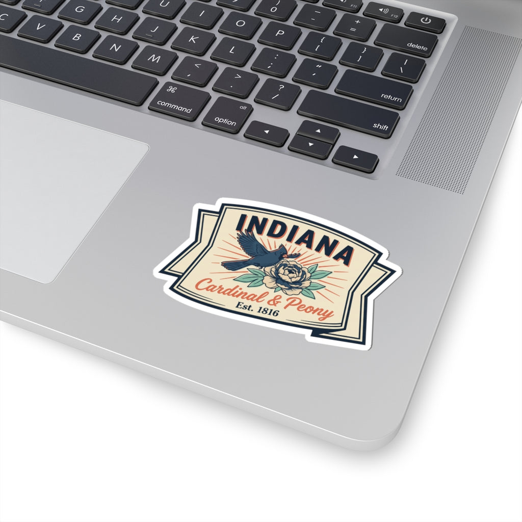 Vinyl sticker applied to a laptop lid with Indiana cardinal and peony badge, Est. 1816.
