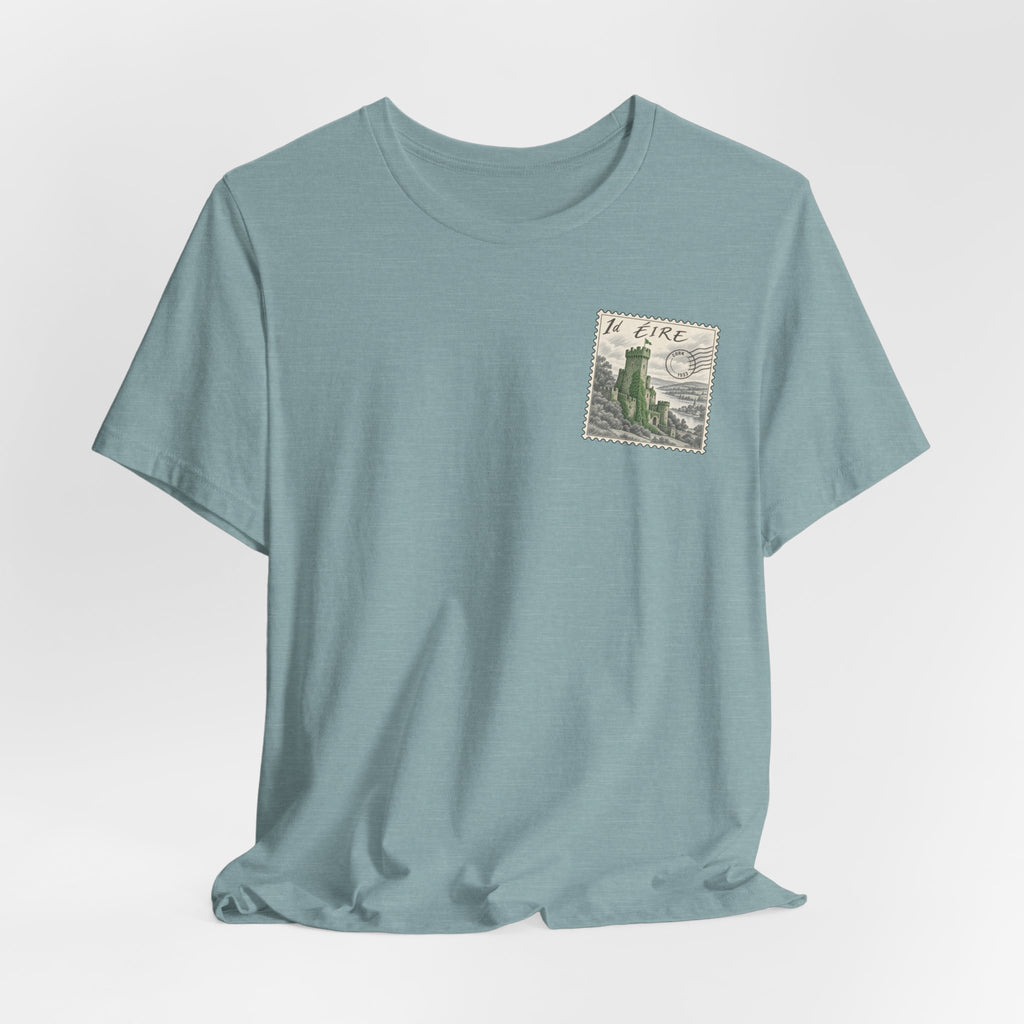 Teal crewneck t-shirt with small vintage postage stamp graphic on chest