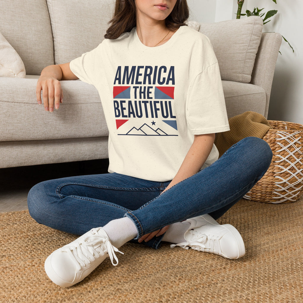 Cream crewneck t-shirt with “AMERICA THE BEAUTIFUL” front graphic print.