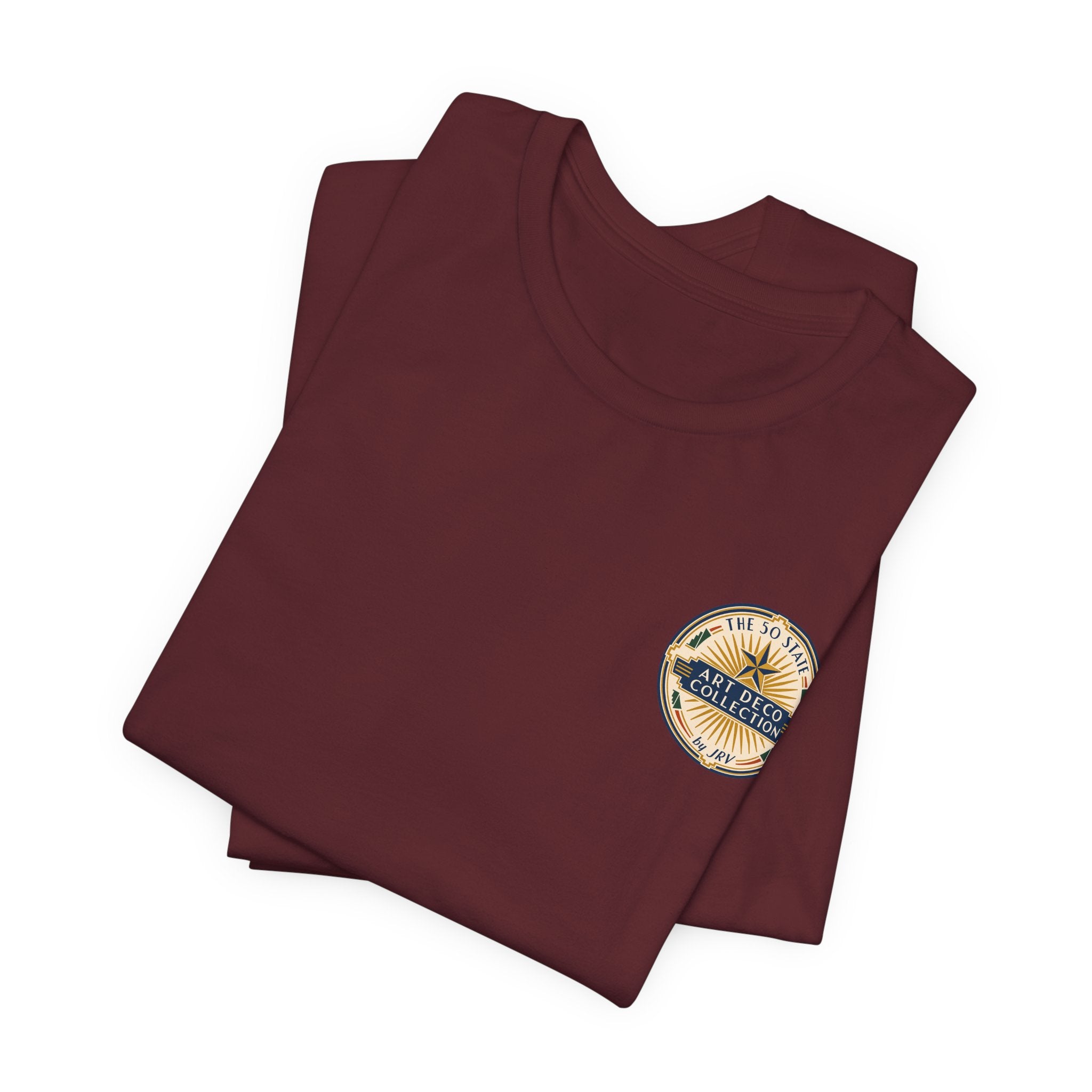 Maroon T-shirt with small round chest emblem; two shirts shown.
