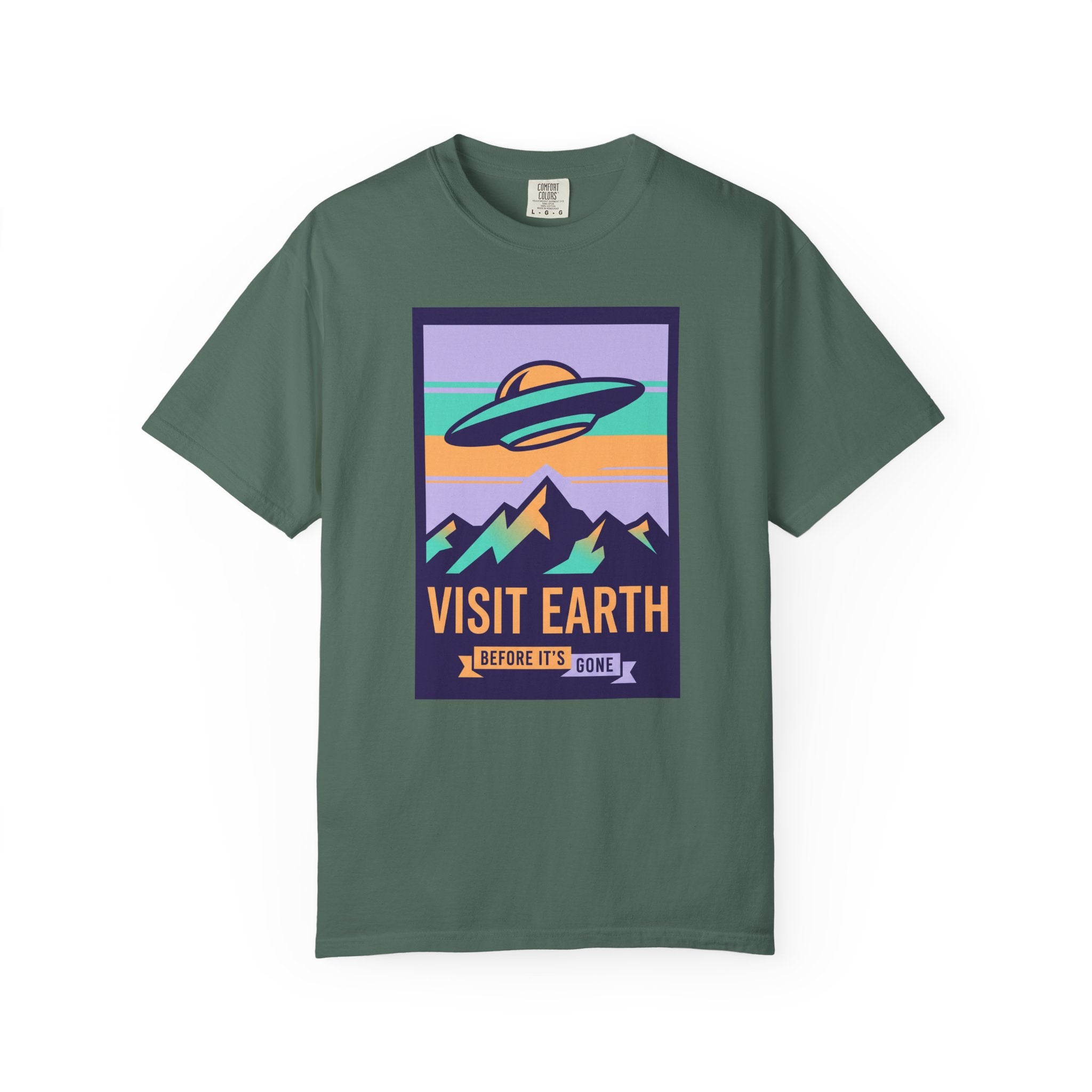 T-shirt with 'Visit Earth' UFO over mountains graphic, deep green